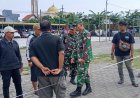 Babinsa Koramil Semampir Kawal Pengukuran Lahan Koperasi Merah Putih di Lapangan Dwikora