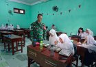 Babinsa Kenjeran Dampingi Penyaluran Makan Bergizi untuk 1.939 Penerima Manfaat