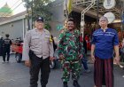 Babinsa Koramil Karangpilang Kawal Jalan Sehat Maulid Nabi, Warga Babatan Antusias